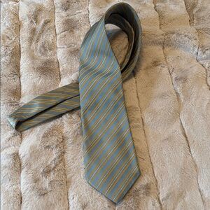 Salvatore Ferragamo Blue and Gold Tie Elegant Accessory